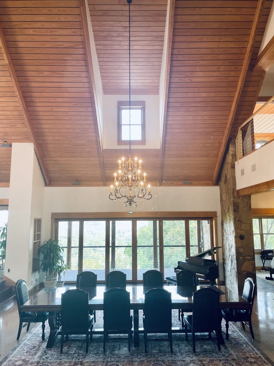 formal dining table and piano. 