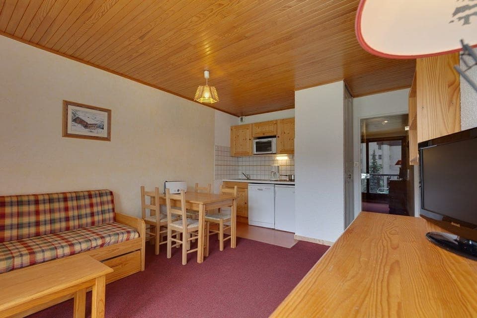 Kick back your feet and relax in the cozy living area.