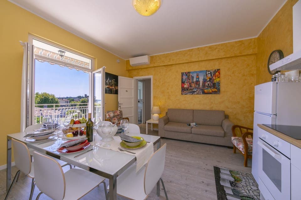 The living room with exit to the balcony