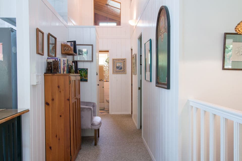 Hallway to the Bedrooms and Baths, Kids' Cabinet with Toys, Books and Games
