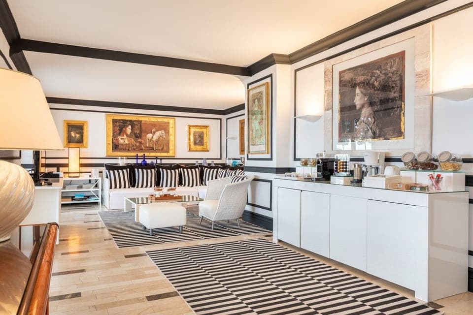 Living room with big comfortable sofa and coffee station in the luxury beachfront villa Sea Diamant in Dubrovnik