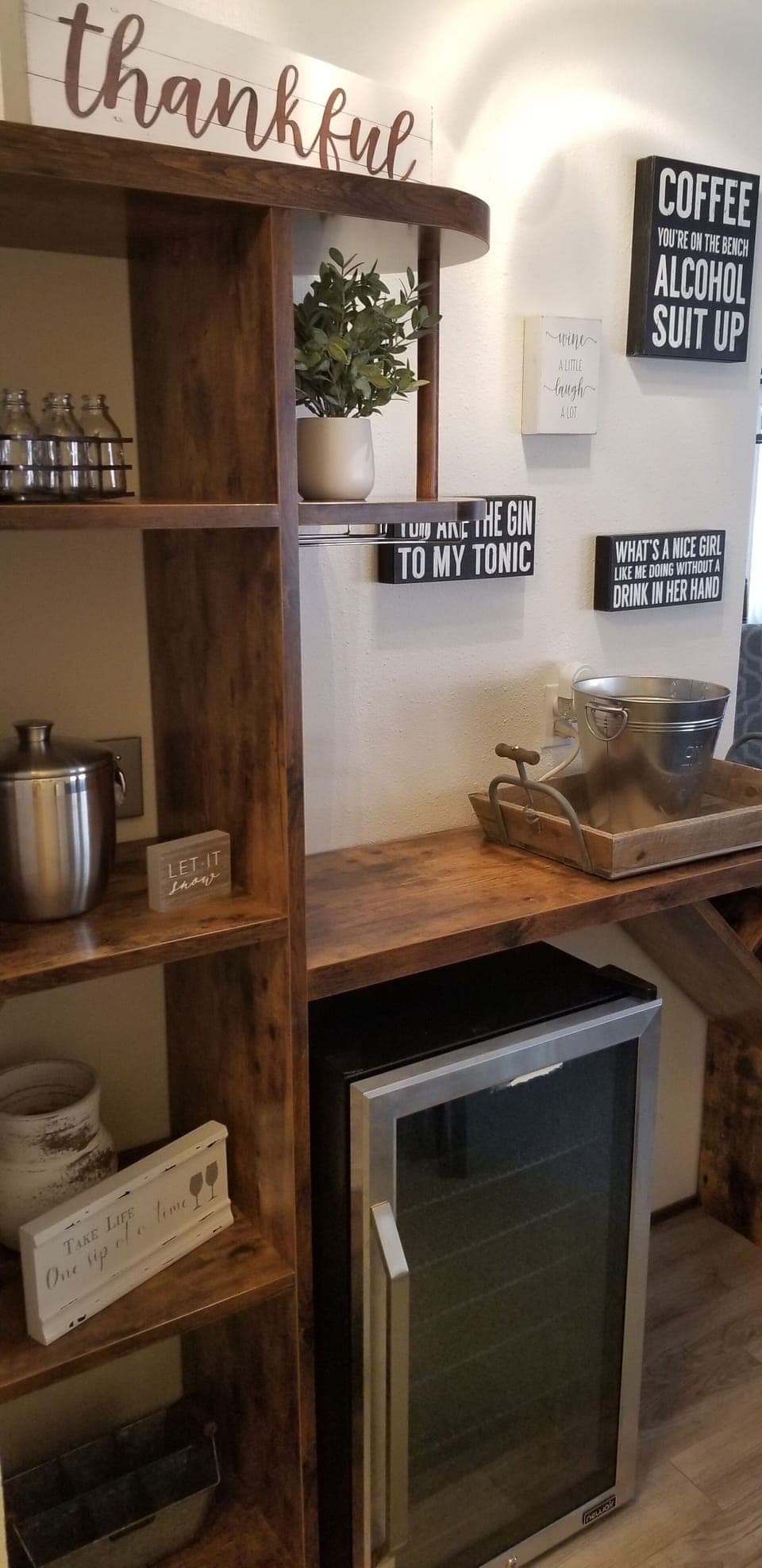 Make a drink at the bar, complete with beverage fridge & ice maker!