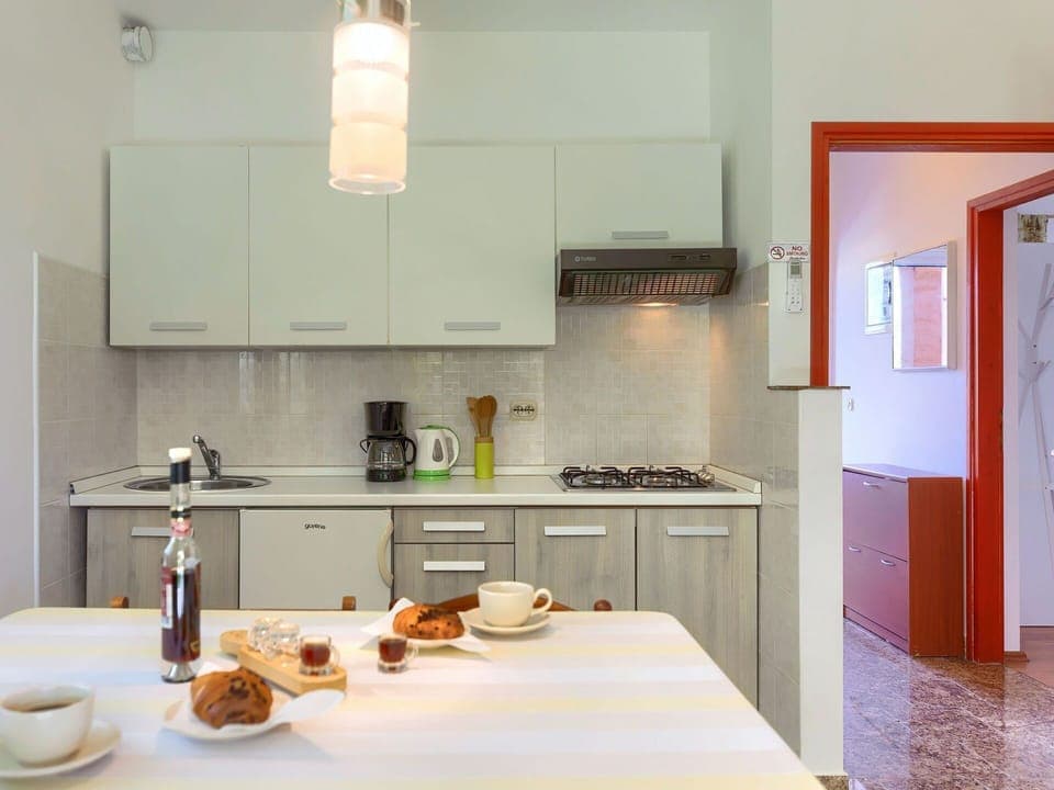 Food, Cabinetry, Property, Countertop, Tableware, Picture Frame, Kitchen, Wood, Kitchen Appliance, Orange