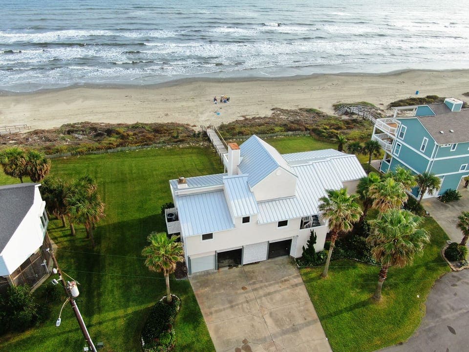 Beachfront home with private lawn and beach walkover, massive deck, & epic views
