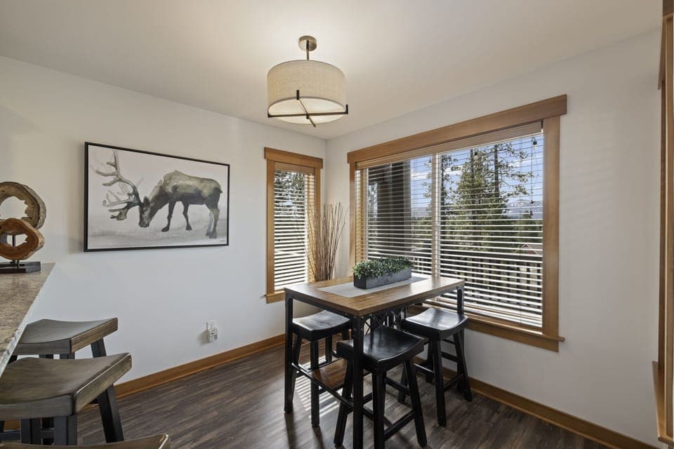 Secondary Dining Nook With Views And View To Outdoor Lounge