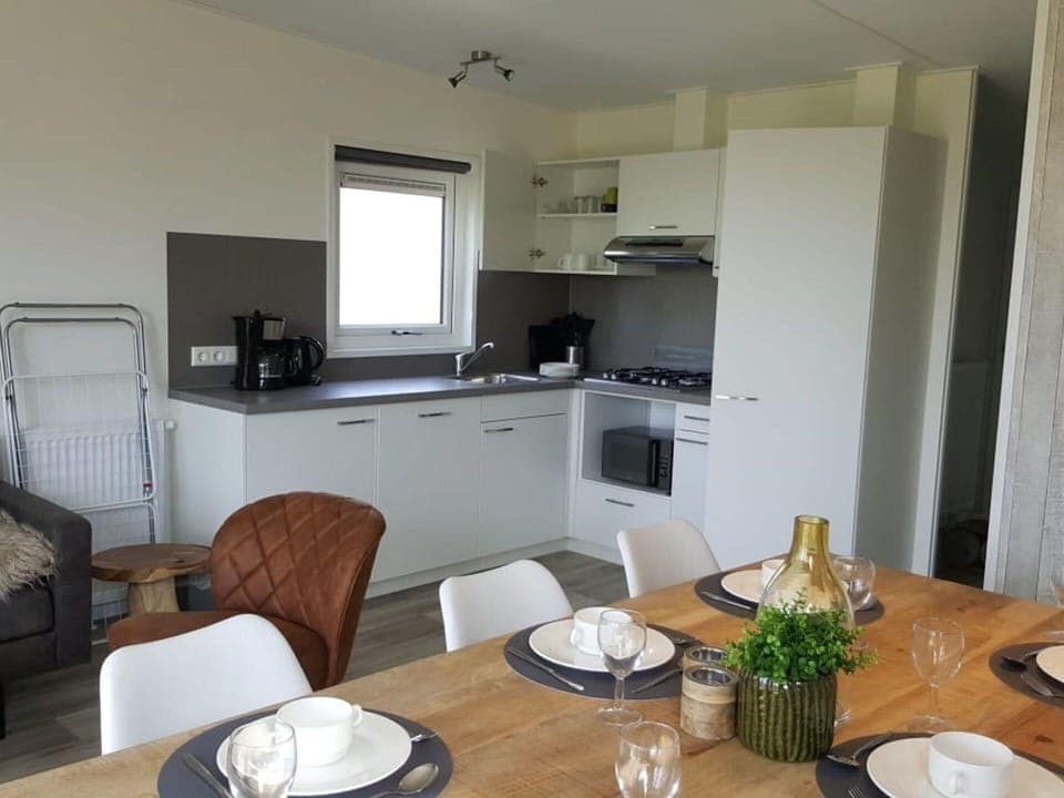 Table, Furniture, Property, Cabinetry, Tableware, Chair, Countertop, Dishware, Wood, Kitchen