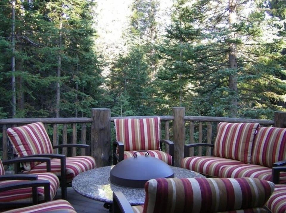 Huge outdoor gas fire pit on deck, with gas grill