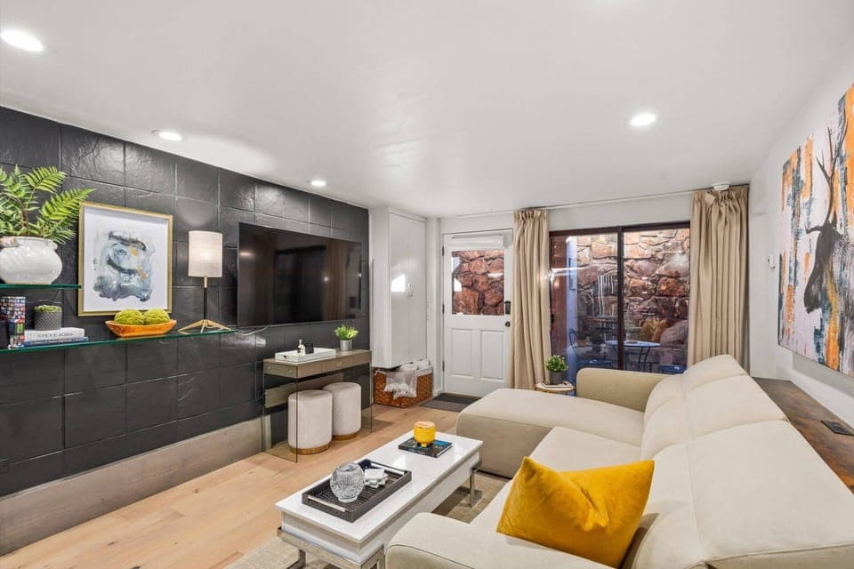 A full kitchen, flat screen TV, and common area washer and dryer, just outside the back door make this a great rental choice!