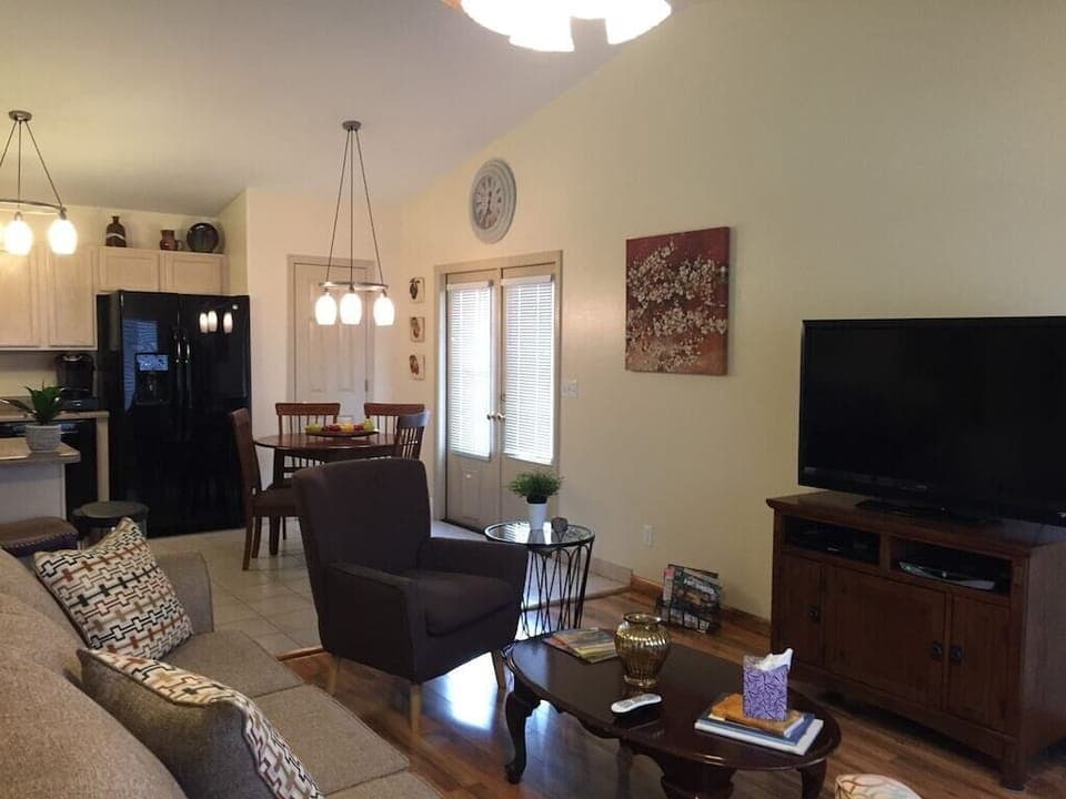 ADJOINING LIVING ROOM  The high ceiling gives a open airy feeling.