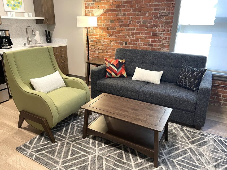 Living room with view of kitchen