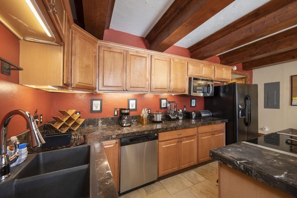 Full kitchen off of the living room.