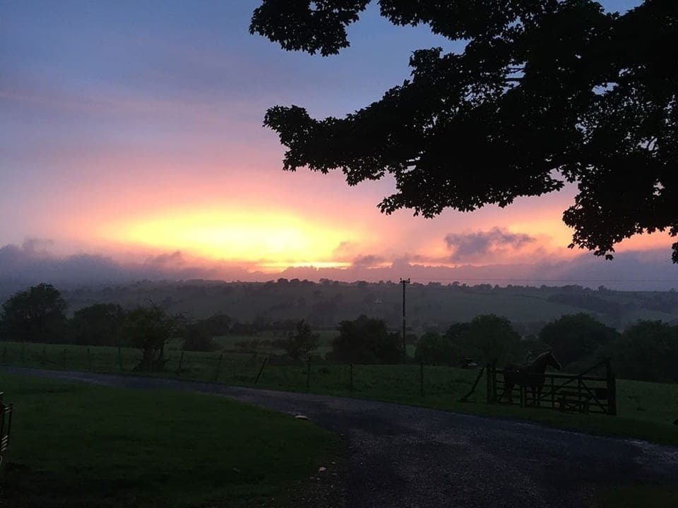 A Sunset from the garage door bench