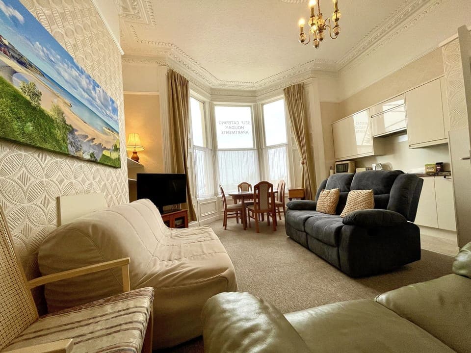 Apartment 1A lounge with recliner sofa