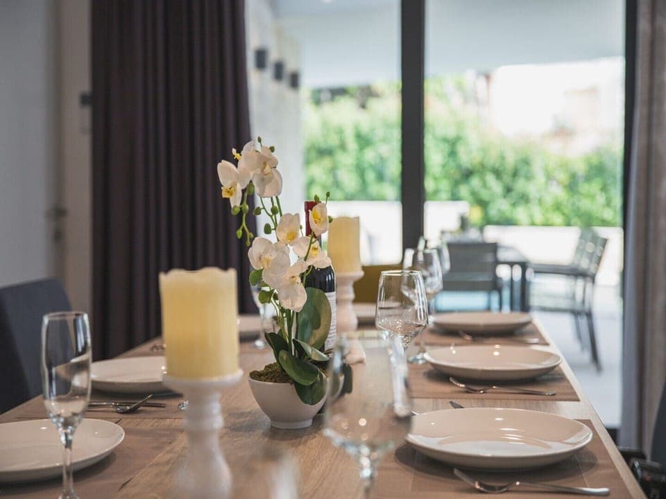 Dining table in a Croatia luxury family villa Trogir 3 with private pool and sea view
