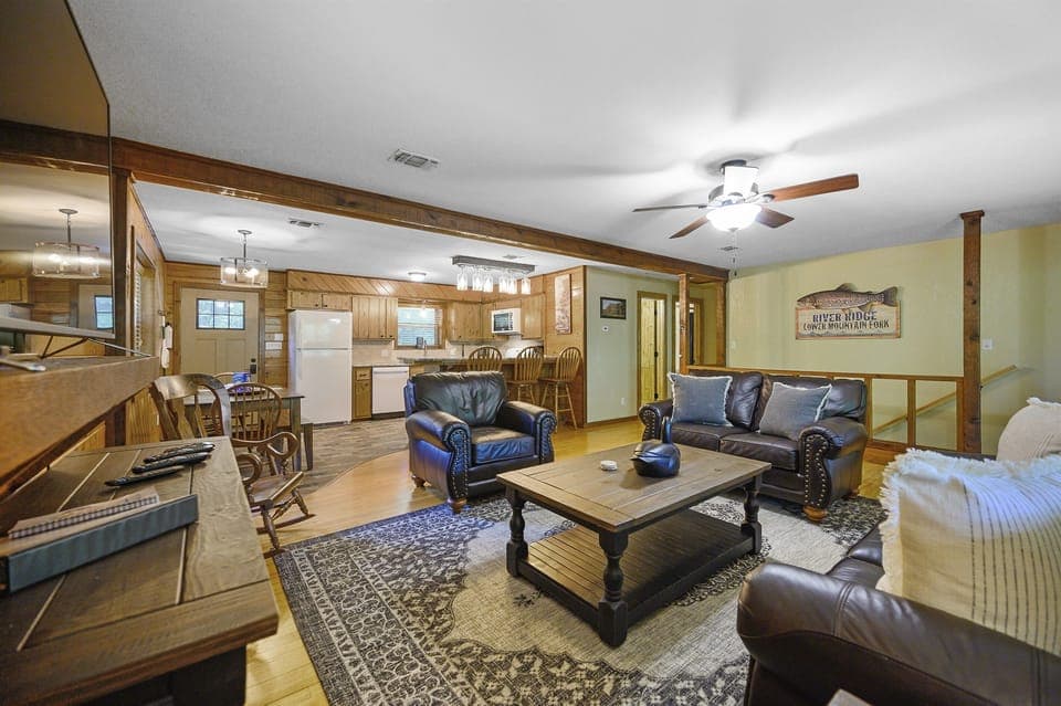 The living room opens to the kitchen and bar area.