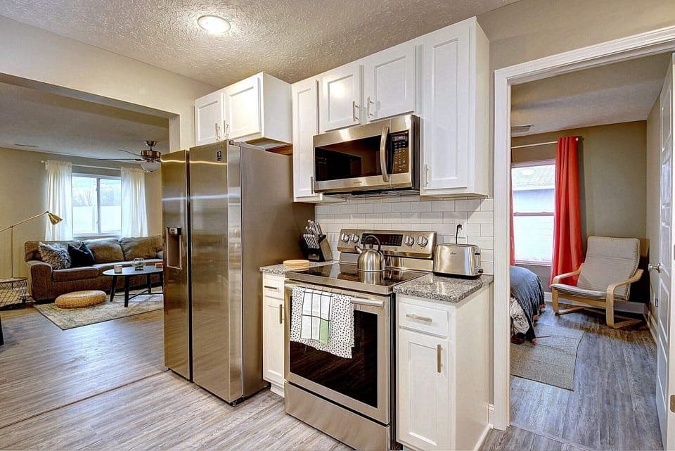 Kitchen coming out of the hall from the two back bedrooms.