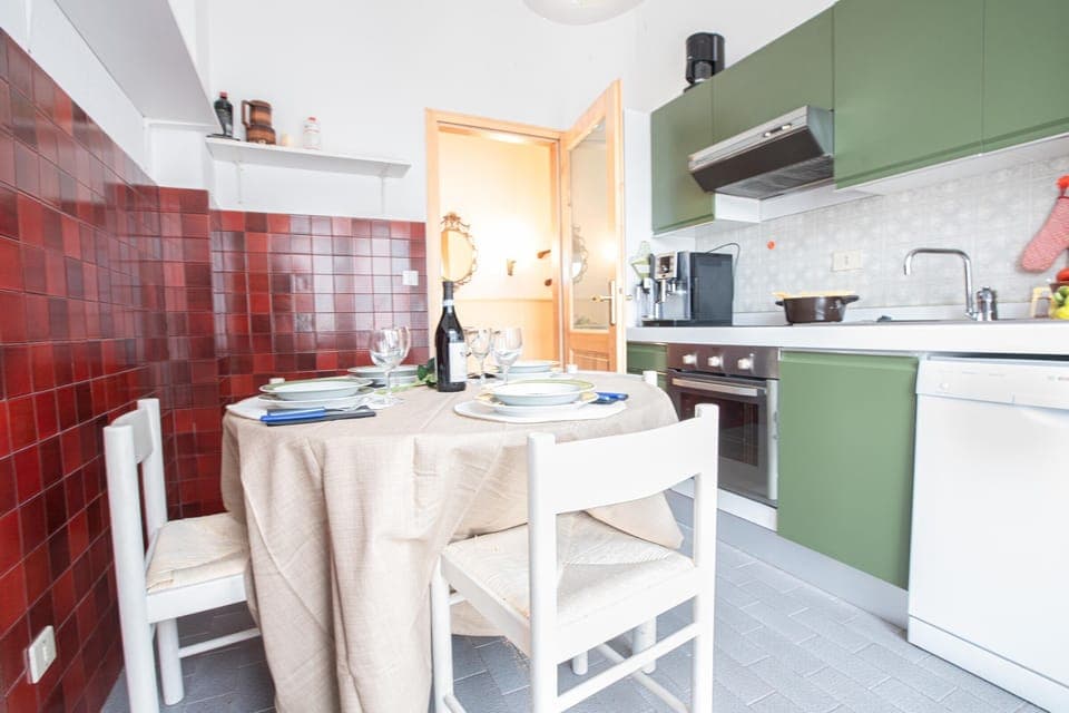 Kitchen with dishwasher, oven, fridge