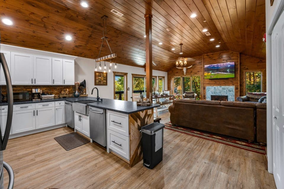 Indulge in culinary delights with a view that takes your breath away! Our fully stocked gourmet kitchen offers the perfect backdrop of majestic mountains. Cook, dine, and savor the flavors of the peaks.