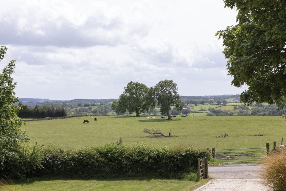 Anvil Cottage - views from the patio over the driveway to the countryside beyond