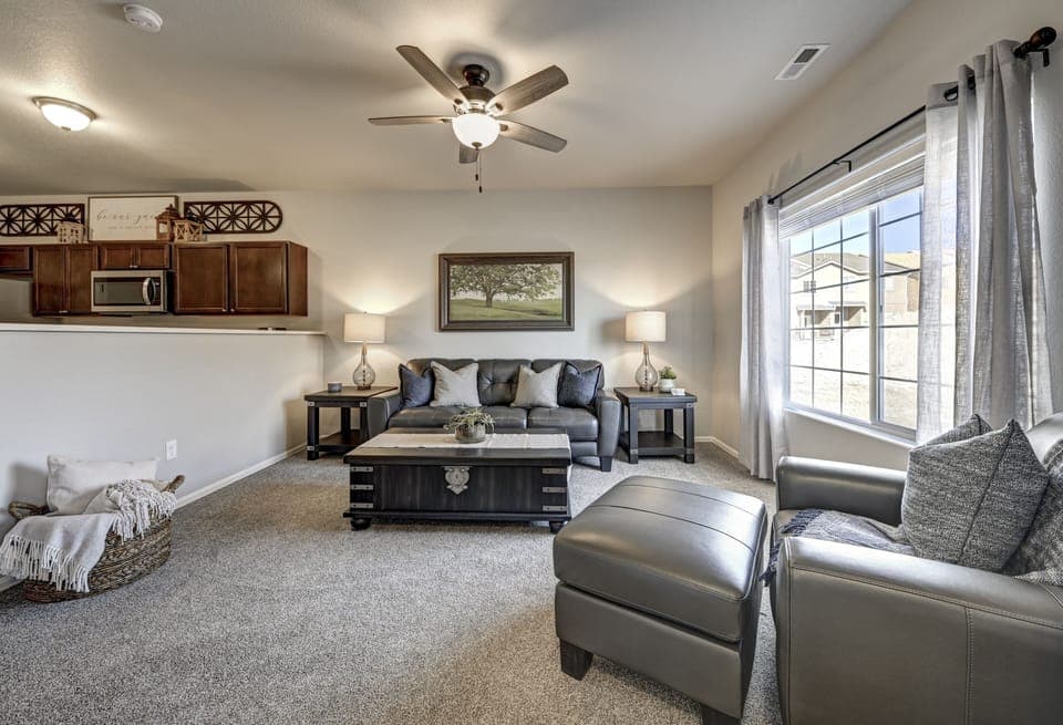Living Room with large window overlooking Park
