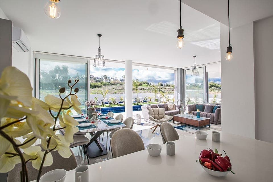 Ground floor surrounded by bi-fold patio doors leading to the garden and pool