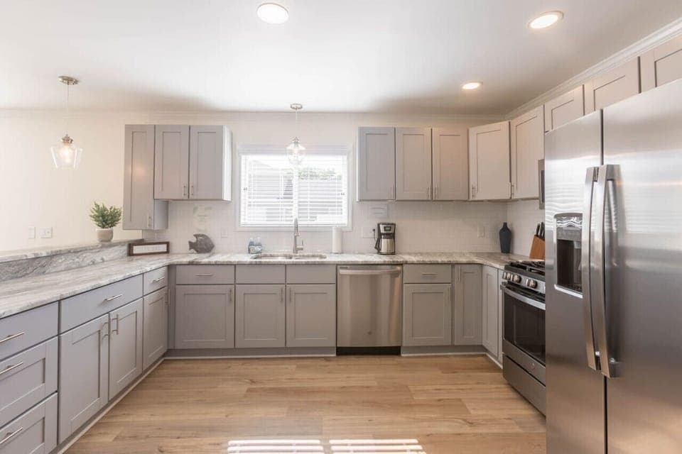 A large kitchen can be found on the main floor in the heart of the home. Enjoy a gas range, oven, full size refrigerator, microwave, dishwasher, and all the basics you need for cooking. We also provide dining ware for kids and a coffee pot.