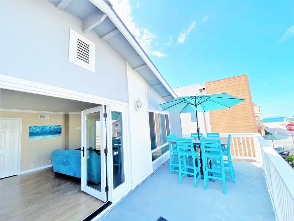 Property # 1 Surf View Upper Unit has French doors which open onto your Ocean and Catalina Island View Balcony!