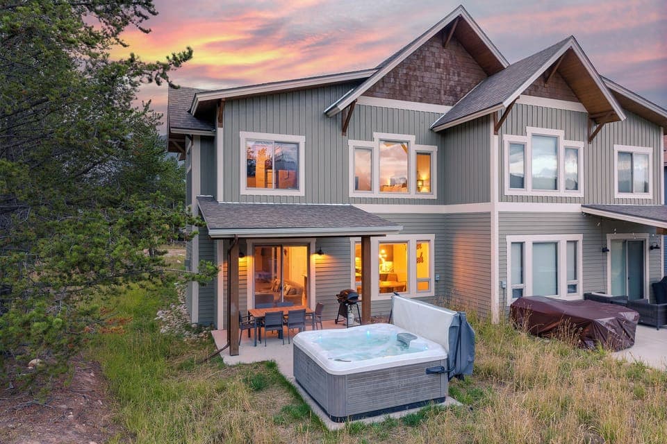 - Covered outdoor dining area with hot tub and scenic views nearby   - Perfect for barbecues and après ski relaxation with family time   - Cozy Colorado rental with outdoor seating for year round comfort