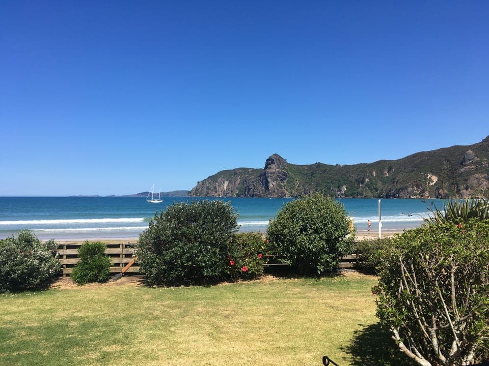 View from balcony over lawn and bay