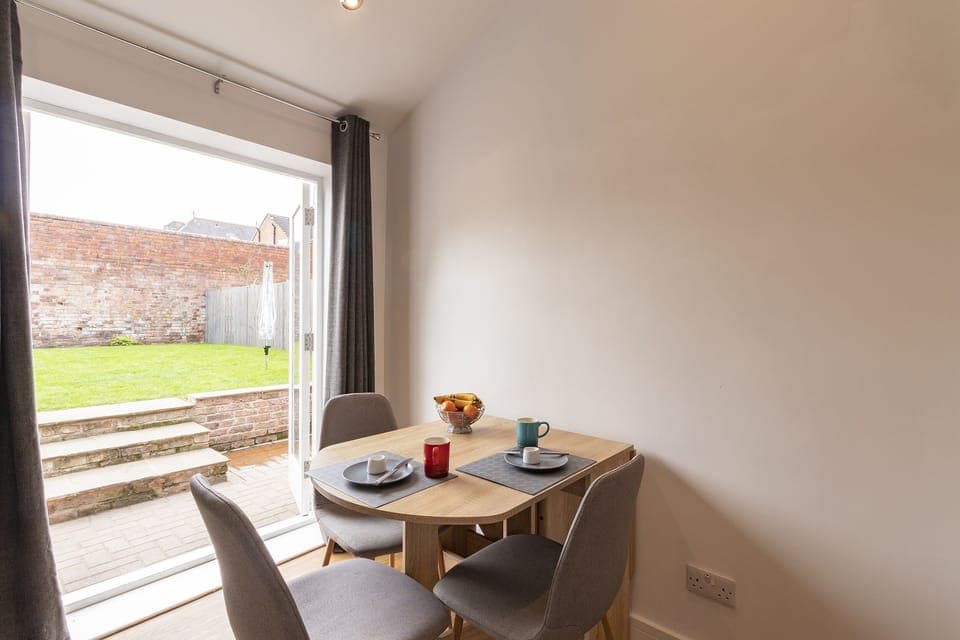 Kitchen diner into private garden / hot tub