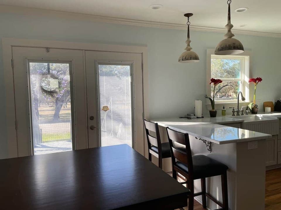 Double doors leading out to 400 sq ft deck.