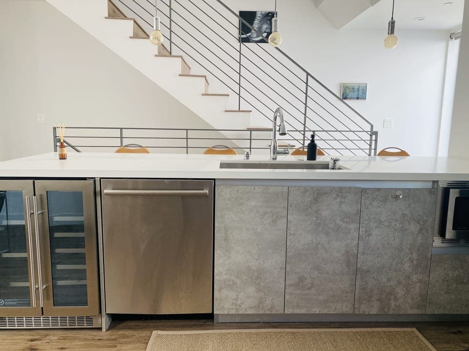 2nd Floor Kitchen Island with wine cooler, dishwasher and microwave. 