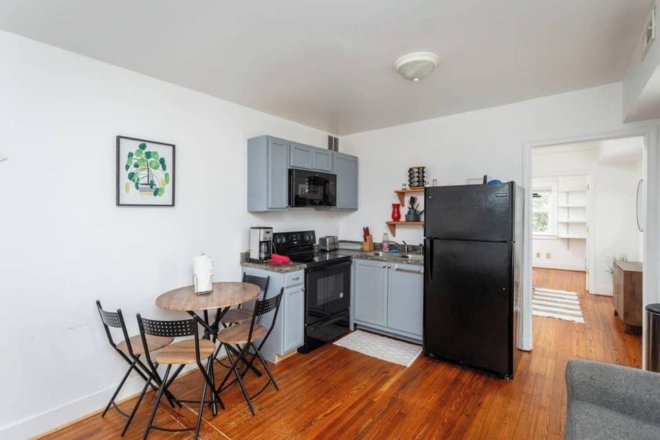 Full size kitchen with refrigerator, stove/oven and microwave