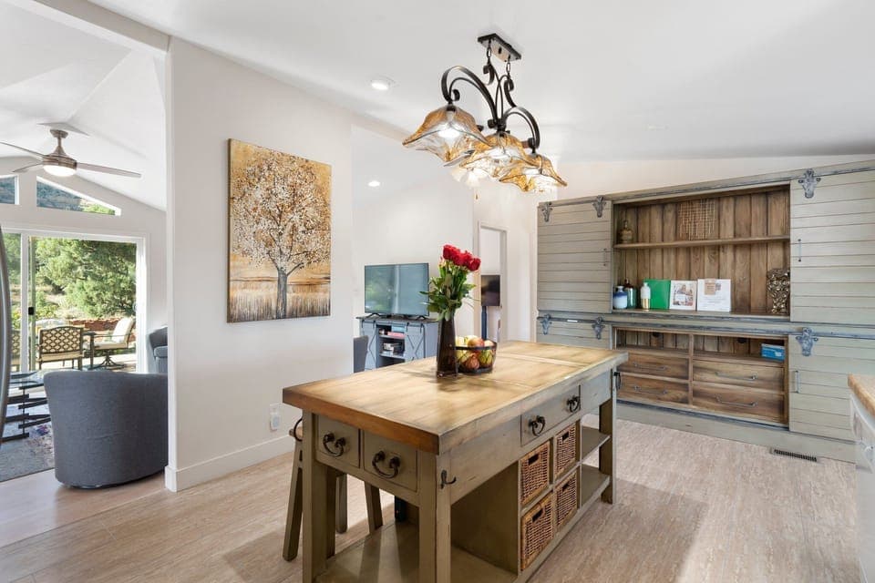 Well-appointed kitchen with access to living room and dining area