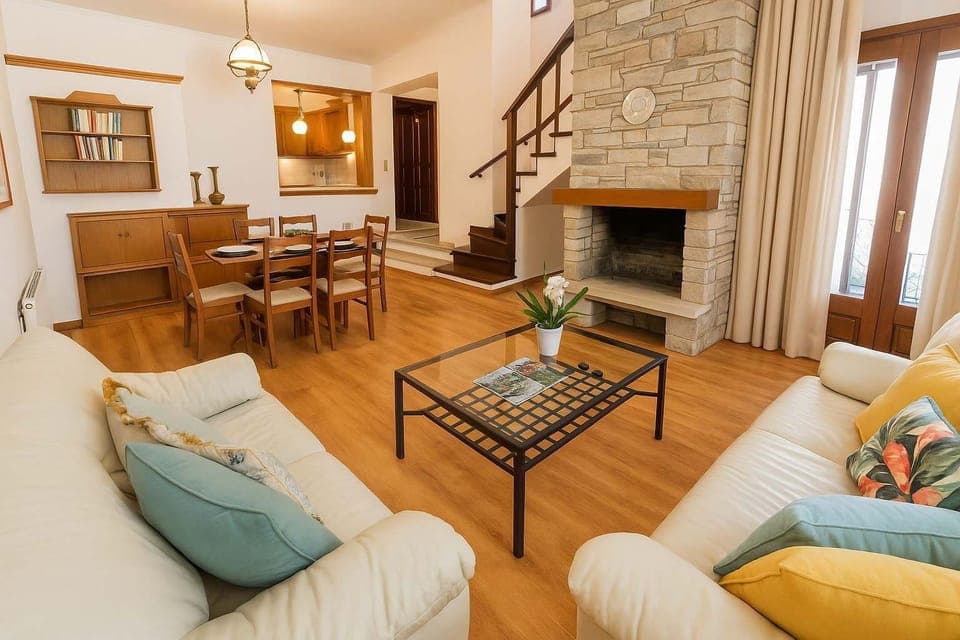 Living Room – Cozy and Sunlit Interior
Relax with comfortable sofas and a warm, homely atmosphere.