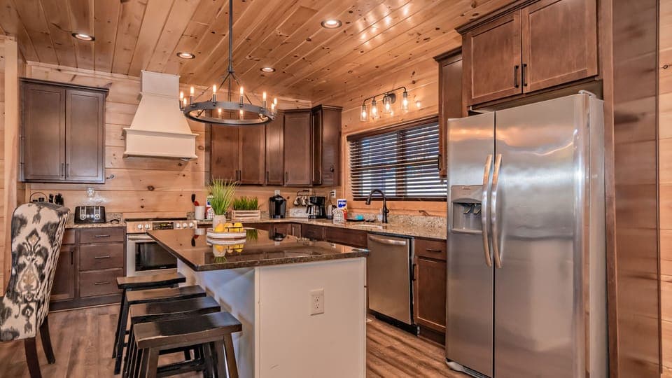 Kitchen island offering additional prep space (or gathering space :-)