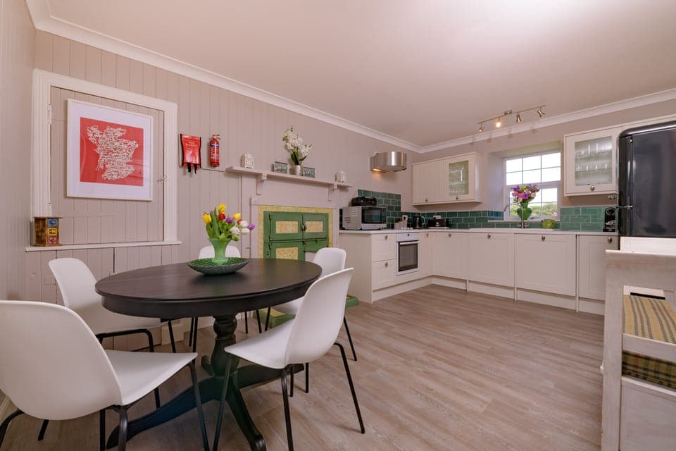 The kitchen featuring the original range cooker (not turned on for safety).