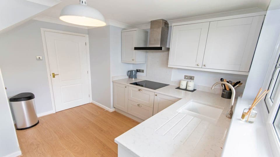 Oceanside kitchen with hob, oven, fridge freezer, dishwasher, washer dryer, toaster and kettle