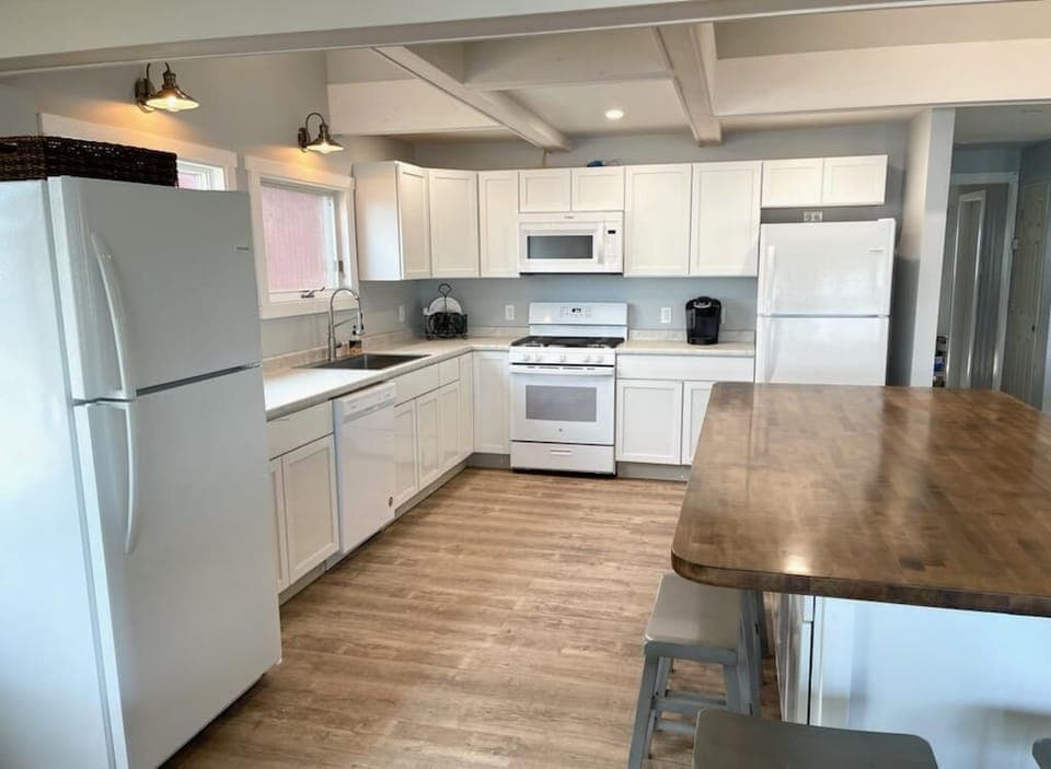 Great room-kitchen, large island, two fridges 