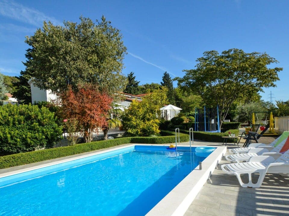 Water, Sky, Plant, Property, Swimming Pool, Azure, Tree, Body Of Water, Shade, Outdoor Furniture