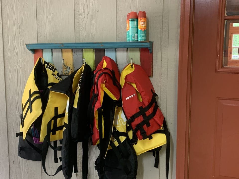 4 adult, 2 small children’s vests 