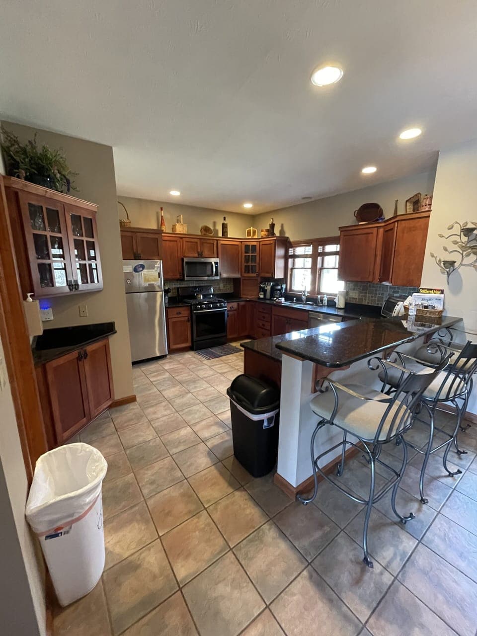 Island seats 3 and table has 8 Chairs