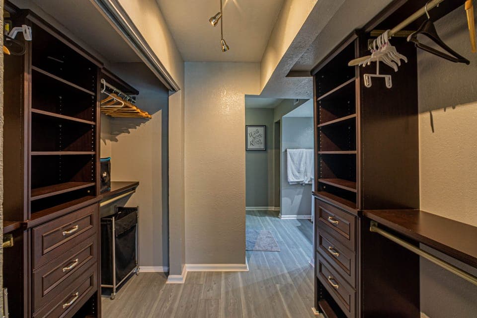 MASTER BEDROOM CLOSET LEADS TO RESTROOM