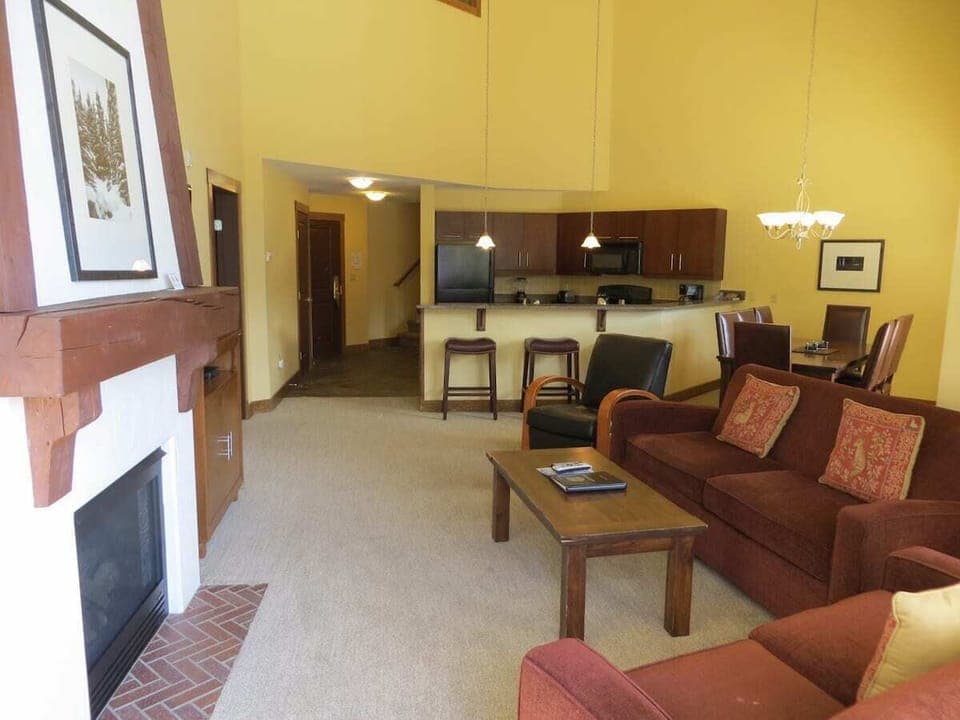 Two story open living area with plenty of seating.