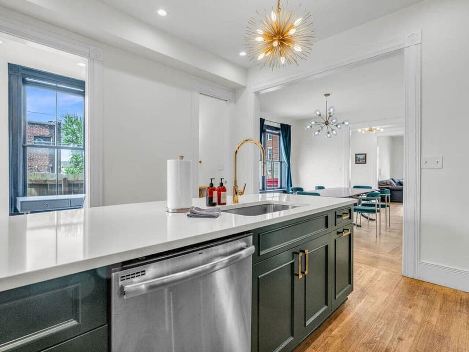 Kitchen: Bright and stylish with modern fixtures and vibrant finishes, perfect for culinary adventures!