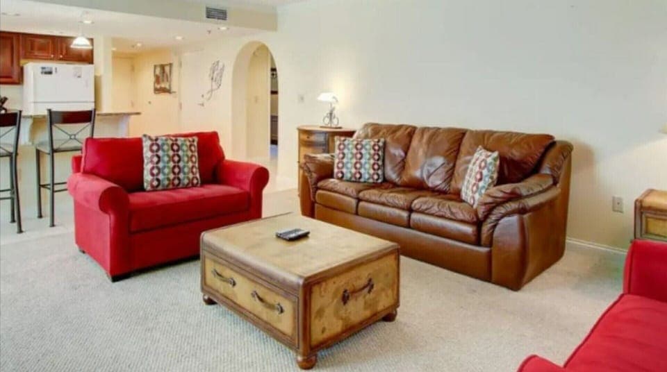 Cozy Family room with 2 red twin pull out sofa beds