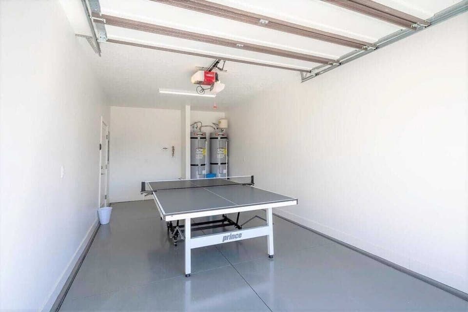 Enjoy ping pong in garage that folds up for parking
