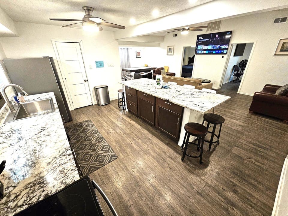 Big kitchen island and 70" smart TV