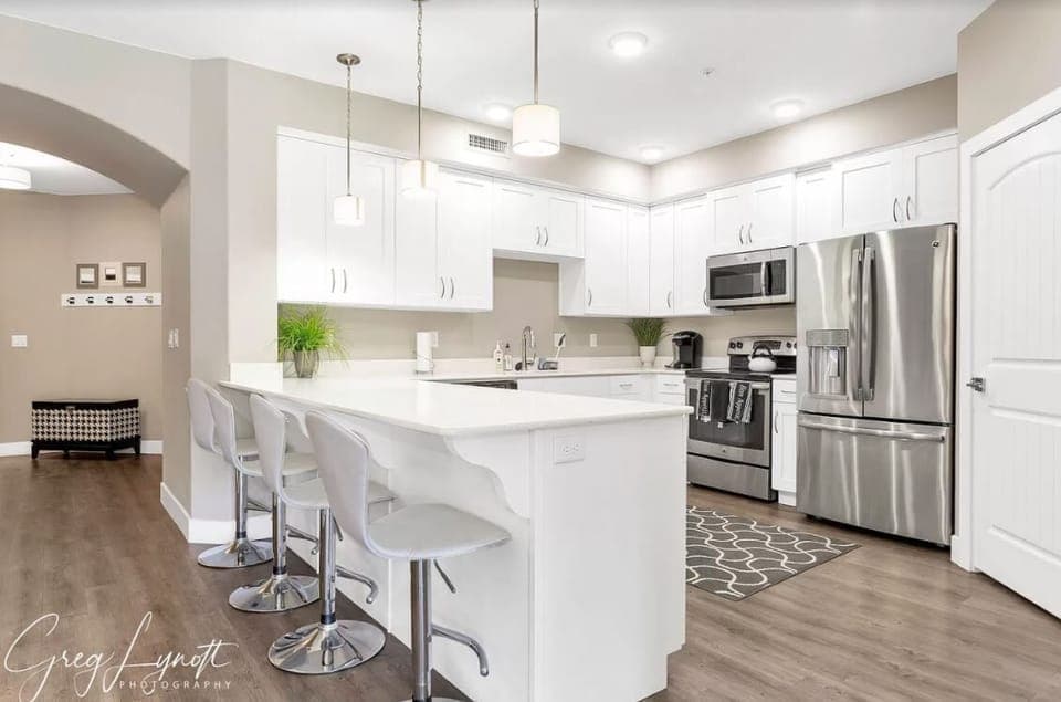 Bright and airy kitchen stocked with everything you need.