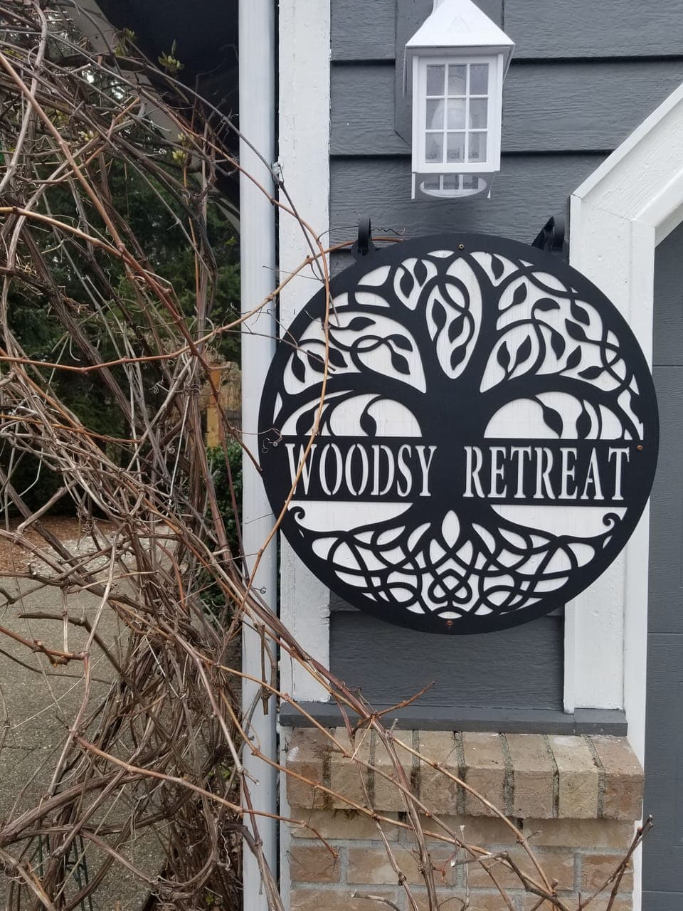 private  parking pad  alongside garage  for guests only